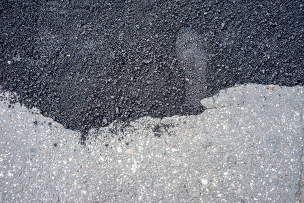 footprint in fresh asphalt